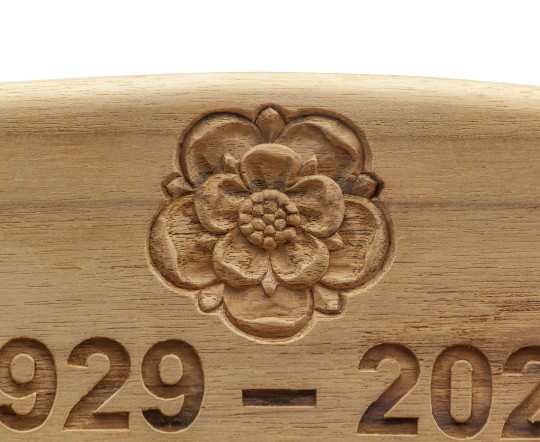 The curved top rail allows for an ideal place for a plaque or carved inscription